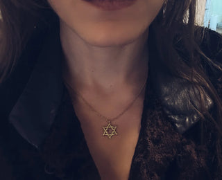 Star of David necklace in support of the headquarters of the families of the abductees